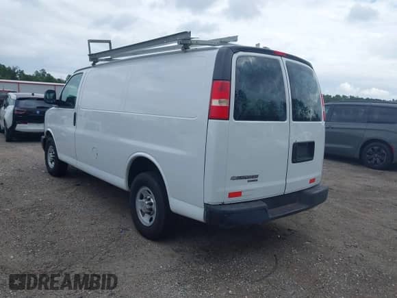 2013 Chevrolet Express Cargo with VIN 1GCWGFCA2D1158787, listed as a IAAI auction lot 43349287 with 189,483 mi miles and . Bid and sale history available at DreamBid. Image 3.