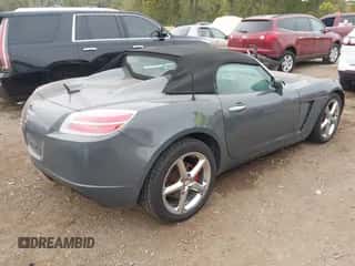 2009 Saturn Sky z VIN 1G8MN35B49Y102294, wystawiony jako IAAI lot #43419840 z przebiegiem 107 304 mil mil oraz . Historia ofert i sprzedaży dostępna na DreamBid. Obrazek 4.