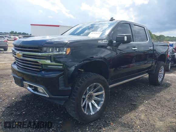 2019 Chevrolet Silverado 1500 High Country с VIN 1GCUYHEL7KZ142131, выставлен на аукционе IAAI как лот 42742660 с пробегом 125 543 миль миль и . История ставок и продаж доступна на DreamBid. Изображение 17.