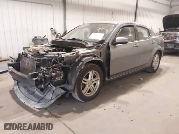 2010 Dodge Avenger R/T with VIN 1B3CC5FB2AN164818, listed as a IAAI auction lot 43230953 with 165,249 mi miles and . Bid and sale history available at DreamBid. Image 2.