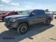 2021 Toyota Tacoma TRD Off Road с VIN 3TMCZ5AN4MM445659, выставлен на аукционе Copart как лот 70141145 с пробегом 104 371 миль миль и Списание • Salvage title. История ставок и продаж доступна на DreamBid. Изображение 1.