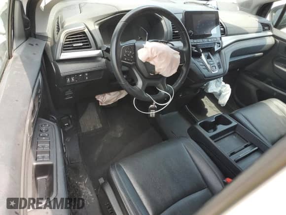 2021 Honda Odyssey EX-L z VIN 5FNRL6H79MB029717, wystawiony jako Copart lot #62089175 z przebiegiem Nie podano mil oraz Szkoda całkowita • Salvage title. Historia ofert i sprzedaży dostępna na DreamBid. Obrazek 8.