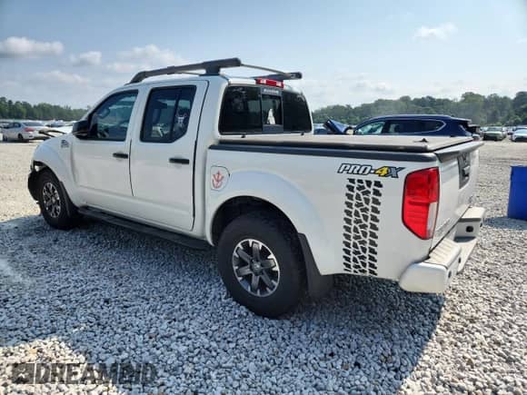 2017 Nissan Frontier Pro-4X with VIN 1N6DD0EV1HN717674, listed as a Copart auction lot 69540635 with 92,630 mi miles and Salvage title. Bid and sale history available at DreamBid. Image 2.