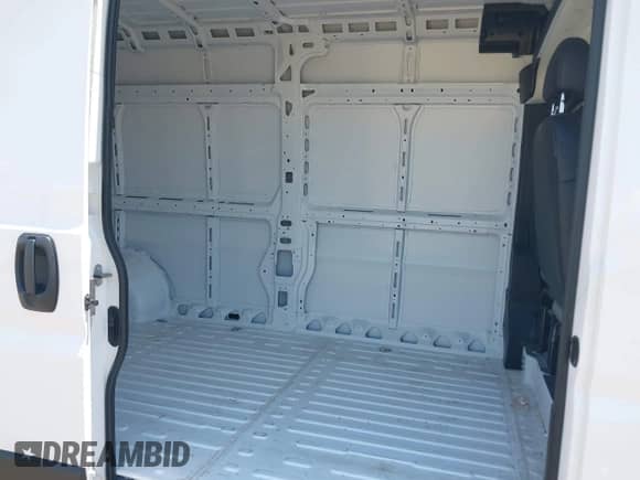 2025 Ram ProMaster Cargo Tradesman with VIN 3C6MRVHG8SE550148, listed as a IAAI auction lot 42910228 with 4,004 mi miles and . Bid and sale history available at DreamBid. Image 8.