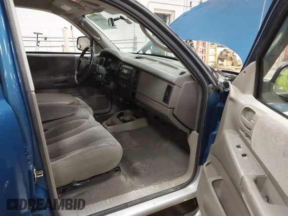 2003 Dodge Dakota SLT z VIN 1D7HG48N03S204480, wystawiony jako IAAI lot #41619868 z przebiegiem 135 359 mil mil oraz . Historia ofert i sprzedaży dostępna na DreamBid. Obrazek 5.