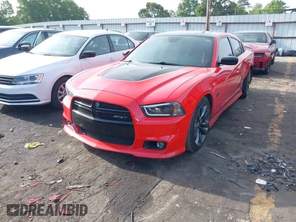 2013 Dodge Charger SRT-8 with VIN 2C3CDXEJ8DH717649, listed as a IAAI auction lot 42224291 with 160,064 mi miles and . Bid and sale history available at DreamBid. Image 2.
