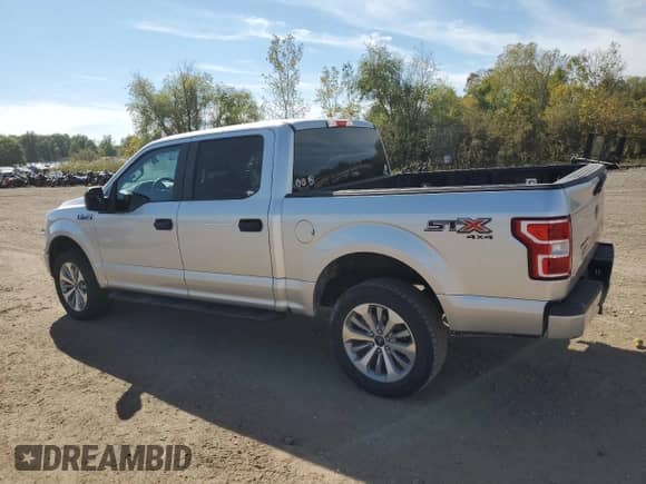 2018 Ford F-150 XL with VIN 1FTEW1E5XJFD94524, listed as a Copart auction lot 82219475 with 30,751 mi miles and Salvage title. Bid and sale history available at DreamBid. Image 2.