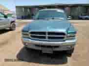 1999 Dodge Dakota SLT z VIN 1B7GG22Y6XS255372, wystawiony jako Copart lot #60740725 z przebiegiem 134 980 mil mil oraz Szkoda całkowita • Salvage title. Historia ofert i sprzedaży dostępna na DreamBid. Obrazek 13.