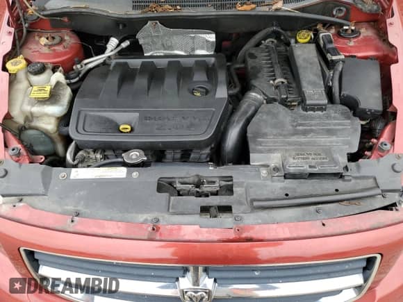 2007 Dodge Caliber SXT with VIN 1B3JB48B17D502533, listed as a Copart auction lot 67518665 with 116,991 mi miles and Salvage title. Bid and sale history available at DreamBid. Image 12.