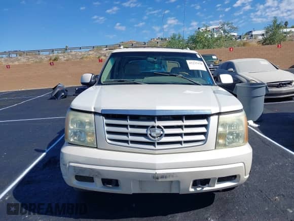 2002 Cadillac Escalade EXT with VIN 3GYEK63N32G288941, listed as a IAAI auction lot 43235158 with 295,475 mi miles and . Bid and sale history available at DreamBid. Image 13.