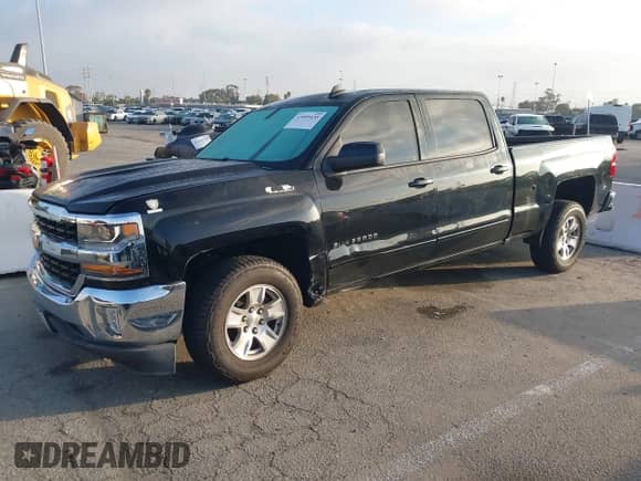 2018 Chevrolet Silverado 1500 LT z VIN 3GCPCREC5JG386053, wystawiony jako IAAI lot #43505435 z przebiegiem 131 243 mil mil oraz . Historia ofert i sprzedaży dostępna na DreamBid. Obrazek 17.