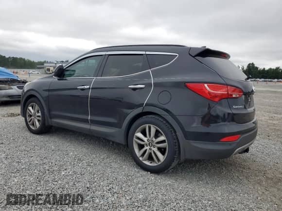 2015 Hyundai Santa Fe с VIN 5XYZW4LA0FG245031, выставлен на аукционе Copart как лот 69493305 с пробегом 141 389 миль миль и Списание • Salvage title. История ставок и продаж доступна на DreamBid. Изображение 2.