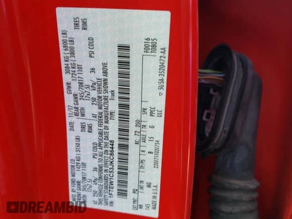 2018 Ford F-150 XL z VIN 1FTEW1C53JKC86448, wystawiony jako Copart lot #82282405 z przebiegiem 108 589 mil mil oraz Szkoda całkowita • Salvage title. Historia ofert i sprzedaży dostępna na DreamBid. Obrazek 13.