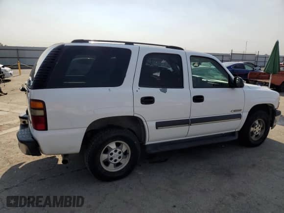 2003 Chevrolet Tahoe LS with VIN 1GNEC13V93J183463, listed as a Copart auction lot 70748215 with 199,454 mi miles and Salvage title. Bid and sale history available at DreamBid. Image 3.