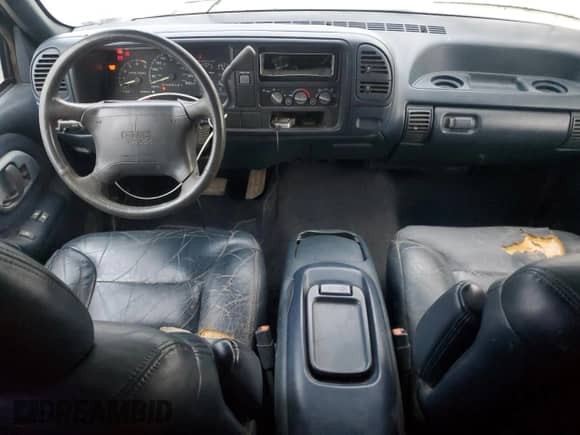 1995 GMC Sierra 1500 z VIN 2GTEC19K0S1537997, wystawiony jako Copart lot #85018174 z przebiegiem 240 831 mil mil oraz Czysty tytuł • Clean title. Historia ofert i sprzedaży dostępna na DreamBid. Obrazek 8.