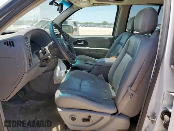 2005 Chevrolet TrailBlazer LT с VIN 1GNDS13S052340475, выставлен на аукционе Copart как лот 67266245 с пробегом Не указан миль и Списание • Salvage title. История ставок и продаж доступна на DreamBid. Изображение 7.