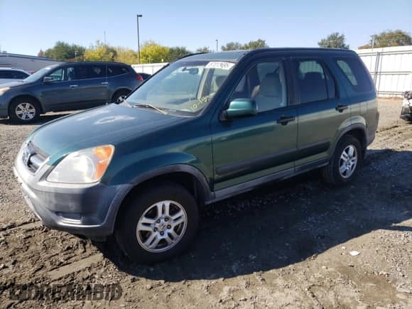 2002 Honda CR-V EX z VIN JHLRD78852C033935, wystawiony jako Copart lot #87013695 z przebiegiem 216 301 mil mil oraz Czysty tytuł • Clean title. Historia ofert i sprzedaży dostępna na DreamBid. Obrazek 1.