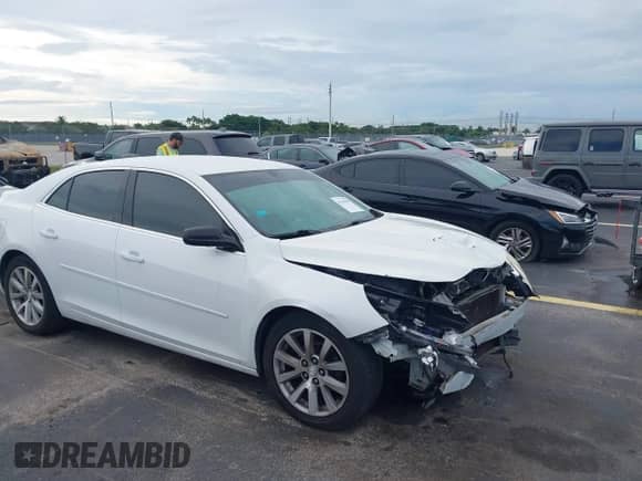 2015 Chevrolet Malibu LS z VIN 1G11A5SL1FU121779, wystawiony jako IAAI lot #43145984 z przebiegiem 149 524 mil mil oraz . Historia ofert i sprzedaży dostępna na DreamBid. Obrazek 1.