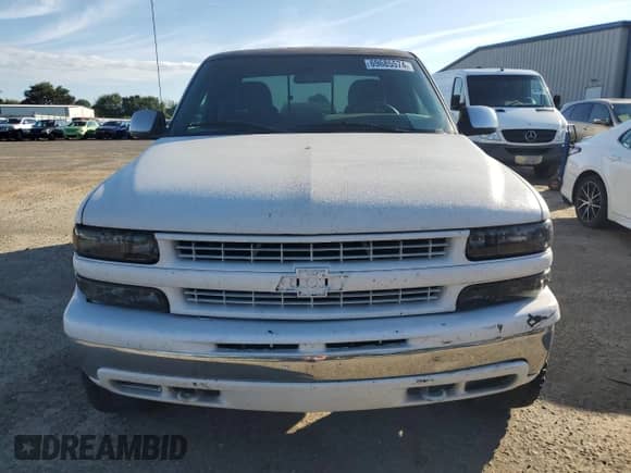 1999 Chevrolet Silverado 2500 LS with VIN 1GCGK29UXXZ180958, listed as a Copart auction lot 69685574 with 210,771 mi miles and Salvage title. Bid and sale history available at DreamBid. Image 5.