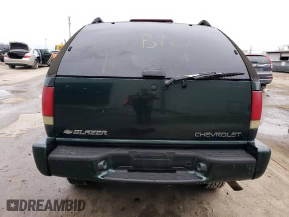 2002 Chevrolet Blazer LS с VIN 1GNCS18W62K138159, выставлен на аукционе Copart как лот 76558393 с пробегом Не указан миль и На запчасти • Non repairable. История ставок и продаж доступна на DreamBid. Изображение 6.