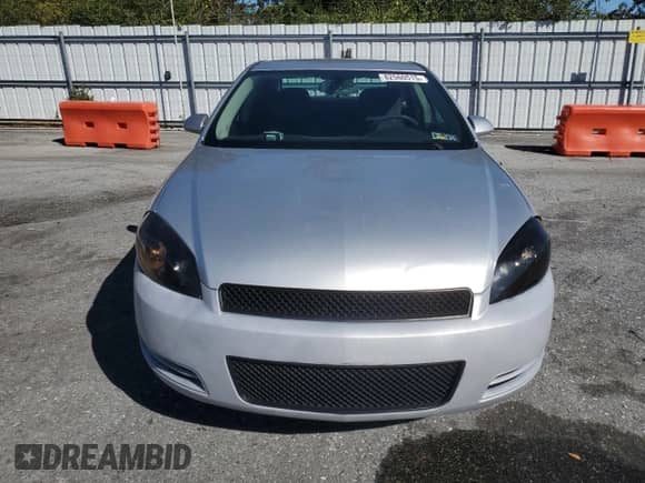 2016 Chevrolet Impala LT with VIN 2G1WB5E3XG1132761, listed as a Copart auction lot 82560515 with 215,655 mi miles and Salvage title. Bid and sale history available at DreamBid. Image 5.