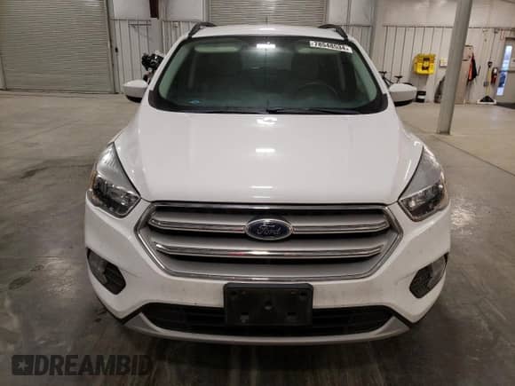2018 Ford Escape SE with VIN 1FMCU9GD6JUC77191, listed as a Copart auction lot 78548534 with 59,360 mi miles and Salvage title. Bid and sale history available at DreamBid. Image 5.