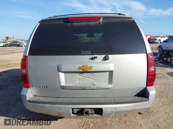 2014 Chevrolet Tahoe LS with VIN 1GNSCAE06ER144631, listed as a IAAI auction lot 42872921 with 196,796 mi miles and . Bid and sale history available at DreamBid. Image 17.