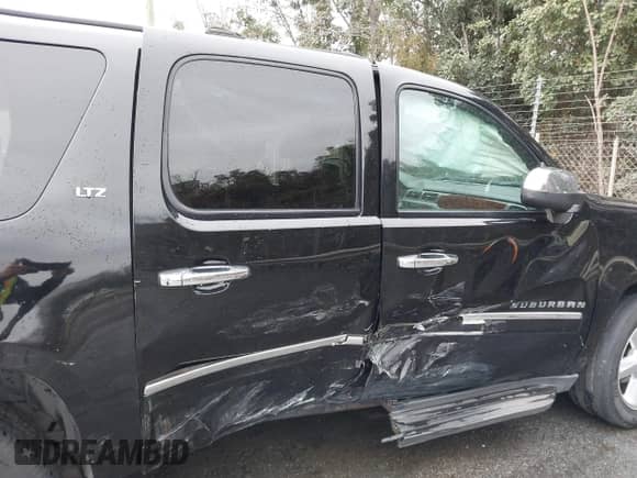 2011 Chevrolet Suburban LTZ с VIN 1GNSCKE02BR206544, выставлен на аукционе IAAI как лот 41159341 с пробегом 218 202 миль миль и . История ставок и продаж доступна на DreamBid. Изображение 13.