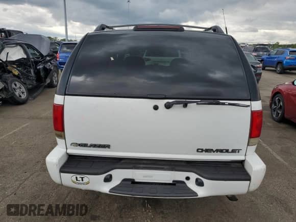 2000 Chevrolet Blazer LT с VIN 1GNCS13W8Y2335804, выставлен на аукционе Copart как лот 57310095 с пробегом 120 743 миль миль и Списание • Salvage title. История ставок и продаж доступна на DreamBid. Изображение 6.