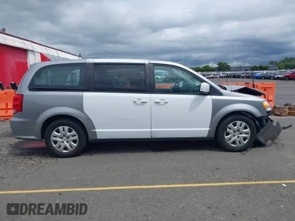 2016 Dodge Grand Caravan SE with VIN 2C4RDGBG9GR182599, listed as a IAAI auction lot 42431587 with 101,167 mi miles and . Bid and sale history available at DreamBid. Image 14.