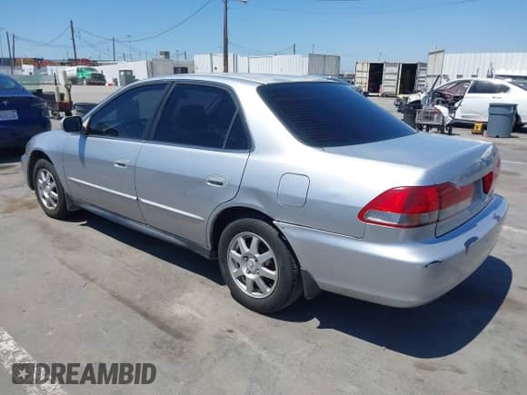 2002 Honda Accord SE with VIN JHMCG56742C010055, listed as a IAAI auction lot 43021484 with 174,310 mi miles and . Bid and sale history available at DreamBid. Image 3.