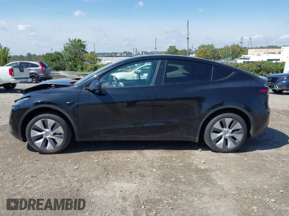 2023 Tesla Model Y Long Range z VIN 7SAYGDEE0PA201841, wystawiony jako IAAI lot #43158634 z przebiegiem 10 356 mil mil oraz . Historia ofert i sprzedaży dostępna na DreamBid. Obrazek 14.