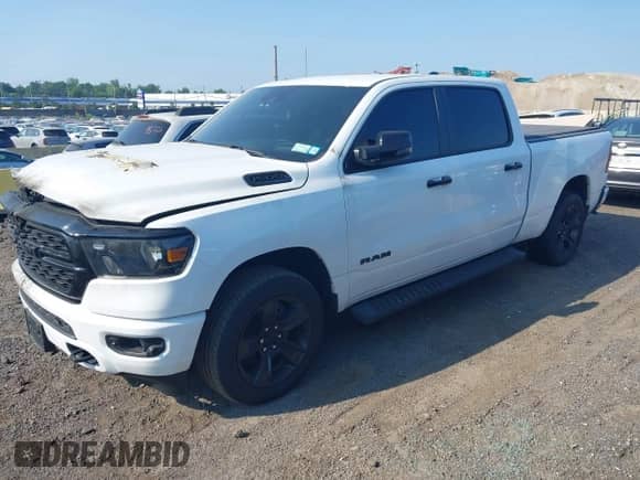 2024 Ram 1500 Big Horn with VIN 1C6SRFMT0RN142488, listed as a IAAI auction lot 42775463 with 24,027 mi miles and . Bid and sale history available at DreamBid. Image 2.