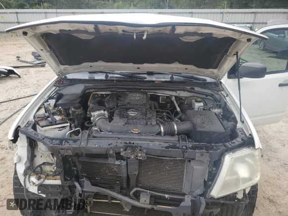 2014 Nissan Frontier SV z VIN 1N6AD0ER0EN743717, wystawiony jako Copart lot #68510725 z przebiegiem 127 940 mil mil oraz Szkoda całkowita • Salvage title. Historia ofert i sprzedaży dostępna na DreamBid. Obrazek 11.