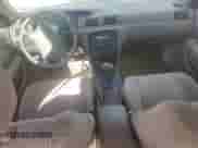 1999 Toyota Camry LE z VIN JT2BG22K4X0337756, wystawiony jako Copart lot #85566635 z przebiegiem 152 366 mil mil oraz Czysty tytuł • Clean title. Historia ofert i sprzedaży dostępna na DreamBid. Obrazek 8.