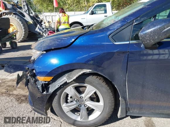 2019 Honda Odyssey EX-L with VIN 5FNRL6H76KB054460, listed as a IAAI auction lot 43404528 with 96,987 mi miles and . Bid and sale history available at DreamBid. Image 22.