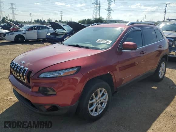2014 Jeep Cherokee Latitude with VIN 1C4PJMCS6EW146116, listed as a Copart auction lot 68736385 with 221,635 mi miles and Salvage title. Bid and sale history available at DreamBid. Image 1.