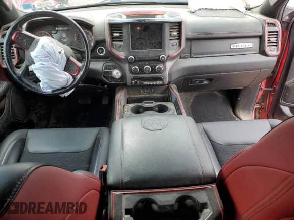 2020 Ram 1500 Rebel z VIN 1C6SRFLT5LN142849, wystawiony jako Copart lot #70570685 z przebiegiem 63 406 mil mil oraz Szkoda całkowita • Salvage title. Historia ofert i sprzedaży dostępna na DreamBid. Obrazek 8.