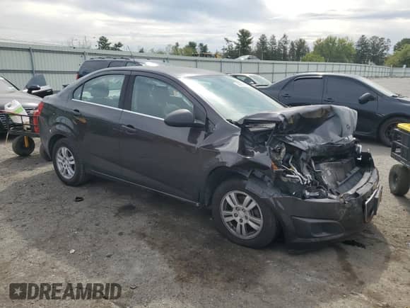 2015 Chevrolet Sonic LT с VIN 1G1JC5SG1F4208305, выставлен на аукционе Copart как лот 80689665 с пробегом 110 244 миль миль и Списание • Salvage title. История ставок и продаж доступна на DreamBid. Изображение 4.