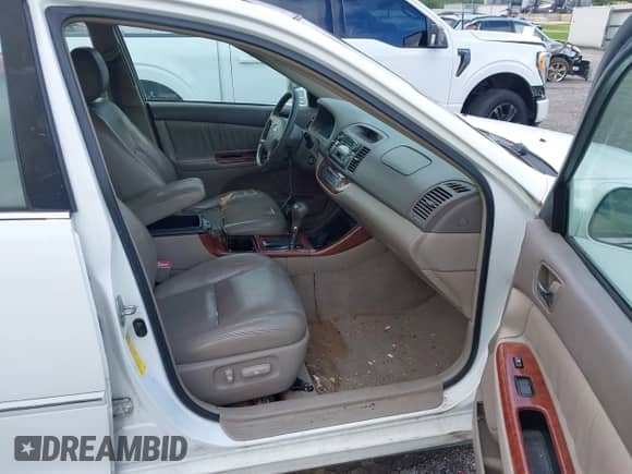 2004 Toyota Camry LE with VIN 4T1BE30KX4U308459, listed as a IAAI auction lot 43001779 with 237,783 mi miles and . Bid and sale history available at DreamBid. Image 5.