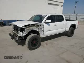 2017 Toyota Tacoma TRD Off Road с VIN 3TMDZ5BN2HM035743, выставлен на аукционе Copart как лот 66354995 с пробегом 216 596 миль миль и Списание • Salvage title. История ставок и продаж доступна на DreamBid. Изображение 1.
