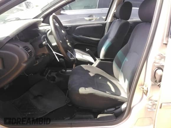 2002 Dodge Neon z VIN 1B3ES26C42D503735, wystawiony jako Copart lot #60634035 z przebiegiem 151 395 mil mil oraz Szkoda całkowita • Salvage title. Historia ofert i sprzedaży dostępna na DreamBid. Obrazek 7.