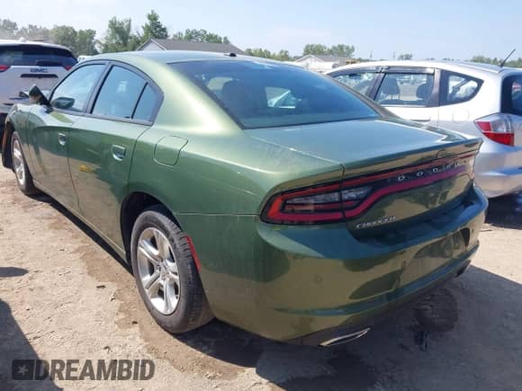 2022 Dodge Charger SXT with VIN 2C3CDXBG4NH197346, listed as a IAAI auction lot 42932630 with 51,412 mi miles and . Bid and sale history available at DreamBid. Image 3.