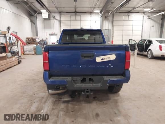 2024 Toyota Tacoma SR5 with VIN 3TMLB5JN3RM054207, listed as a IAAI auction lot 41171946 with 3,808 mi miles and . Bid and sale history available at DreamBid. Image 16.