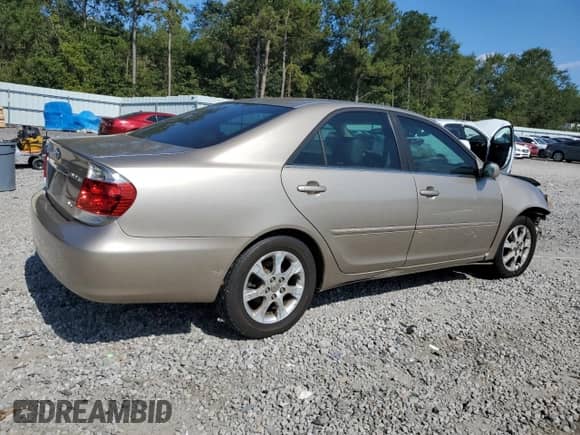 2005 Toyota Camry LE с VIN JTDBF30K050163989, выставлен на аукционе Copart как лот 69534195 с пробегом 289 449 миль миль и Списание • Salvage title. История ставок и продаж доступна на DreamBid. Изображение 3.
