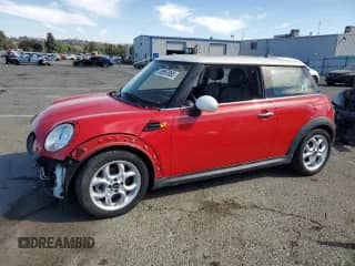 2011 MINI Hardtop with VIN WMWSU3C5XBT092707, listed as a Copart auction lot 69597085 with 42,106 mi miles and Salvage title. Bid and sale history available at DreamBid. Image 1.