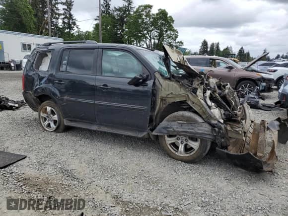 2015 Honda Pilot EX-L with VIN 5FNYF4H77FB013767, listed as a Copart auction lot 56992085 with 106,392 mi miles and Salvage title. Bid and sale history available at DreamBid. Image 4.