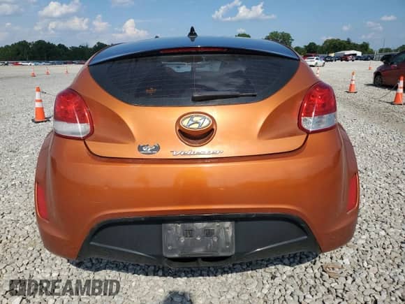 2013 Hyundai Veloster w/Black Int с VIN KMHTC6AD9DU094754, выставлен на аукционе Copart как лот 64644975 с пробегом 165 871 миль миль и Списание • Salvage title. История ставок и продаж доступна на DreamBid. Изображение 6.