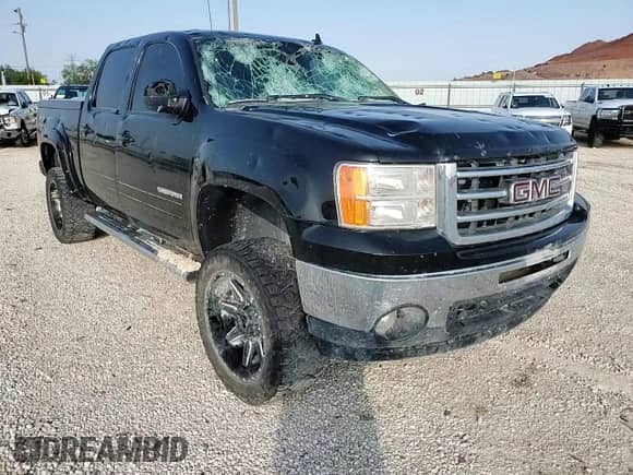 2013 GMC Sierra 1500 SLT с VIN 3GTP2WE74DG213892, выставлен на аукционе Copart как лот 60900705 с пробегом 202 145 миль миль и Чистый • Clean title. История ставок и продаж доступна на DreamBid. Изображение 14.