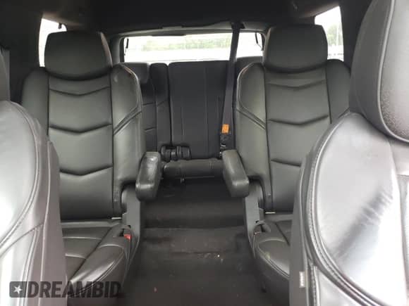 2015 Cadillac Escalade Platinum с VIN 1GYS4PKJ9FR599510, выставлен на аукционе Copart как лот 56688215 с пробегом 292 890 миль миль и Списание • Salvage title. История ставок и продаж доступна на DreamBid. Изображение 10.